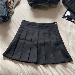 black pleated skirt